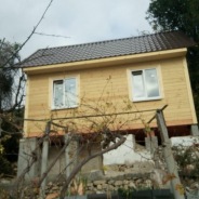 Фото готовых работ - Дом из бруса камерной сушки 6х4 (Д-99) + мобильная баня 6х2,2 м.