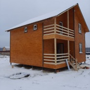 Фото готовых работ - Каркасно-щитовой дом 7.5 х 7.5 м + терраса 3.0 х 4.0 м