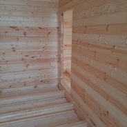 Фото готовых работ - Дом под усадку из проф. бруса естественной влажности 10х10 м