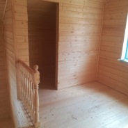 Фото готовых работ - Каркасный дом 8,0×8,0 м. + терраса 3,0×6,0 м.